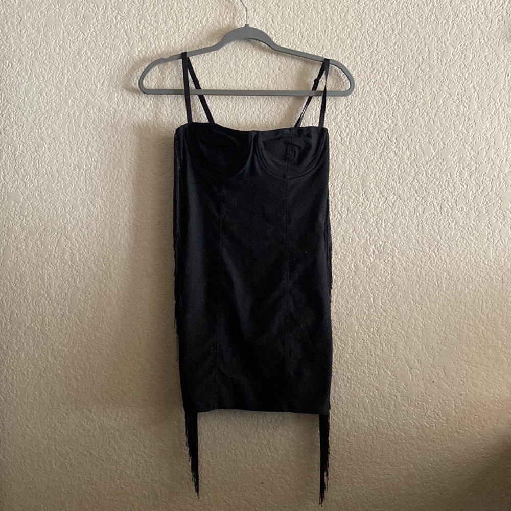 Short black dress with tassels on the side in size small